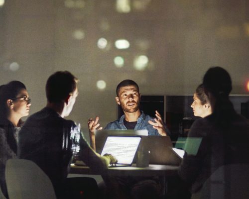 Shot of creative employees working late in the office